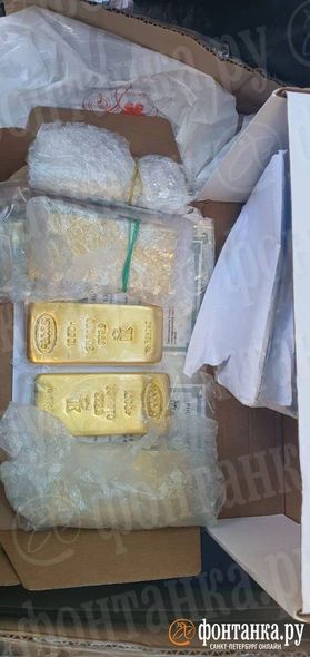 Priqojinin ofisində tapılanlar: qızıl külçələr, saxta pasportlar, ağ toz, tapançalar... - FOTOLAR