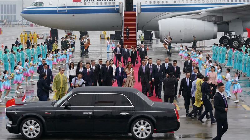Syria s President Bashar al Assad and his wife Asma are welcomed upon their arrival at Hangzhou airport China Picture SANA Handout via Reuters