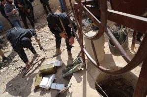 Bu ölkənin iki şəhərində silah dolu quyu və anbar aşkar edilib