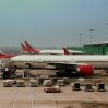 Air India A320 and Boeing 777 300ERS at Indira Gandhi Airport Delhi India February 2013