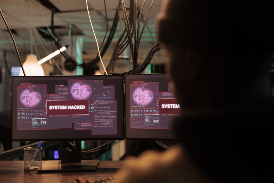system hacked alert message computer screen hacker breaking into database server criminal cyberattack malicious software password cracking program information stealing