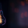 burning lamp hangs dark blurred background space text scaled 1