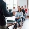 cheerful mood group people business conference modern classroom daytime scaled 1