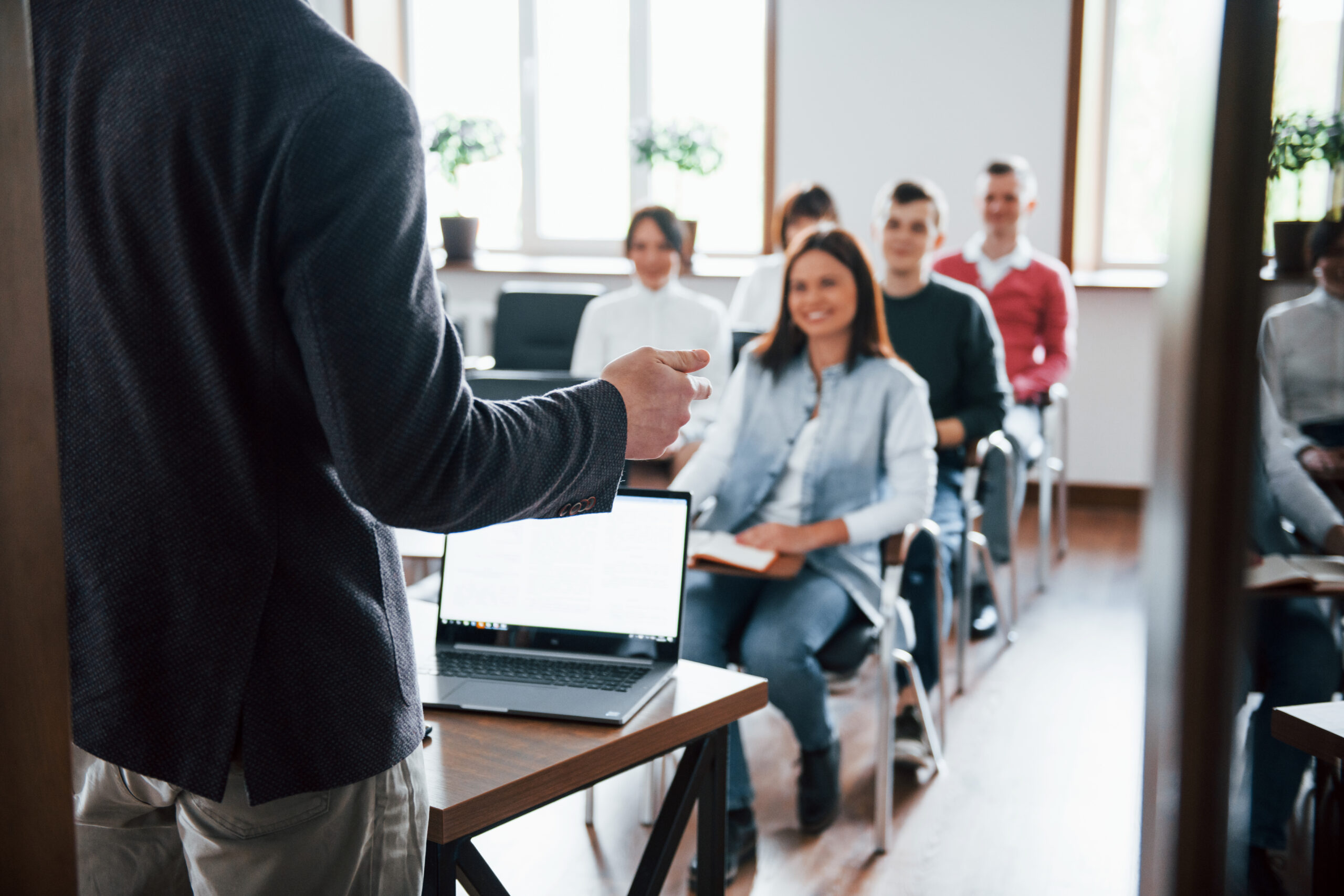 cheerful mood group people business conference modern classroom daytime scaled