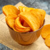 high resolution photo delicious homemade chips newspaper gray table