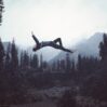 man jumping against sky scaled 1
