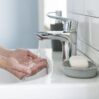 side view person preparing wash their hands sink 1