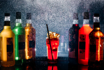 front view different drinks colorful inside bottles