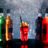front view different drinks colorful inside bottles