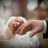 midsection couple holding hands