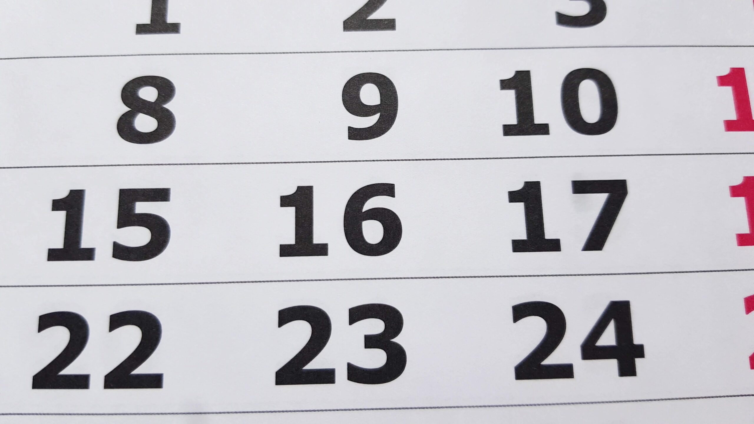 closeup calendar with dates days week top view slow motion camera 4k video scaled